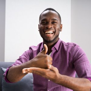 African American Deaf Man Using Sign Language